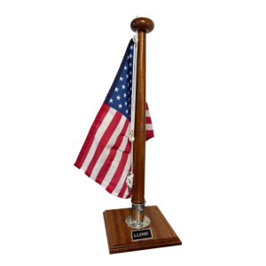 Desktop flagstaff with luxe logo laser engraved on plaque