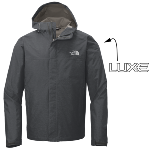 Dark Grey Heather Colored Men's North Face Rain Jacket with Arrow Pointing to where the Luxe Logo Will be Embroidered on Left Sleeve