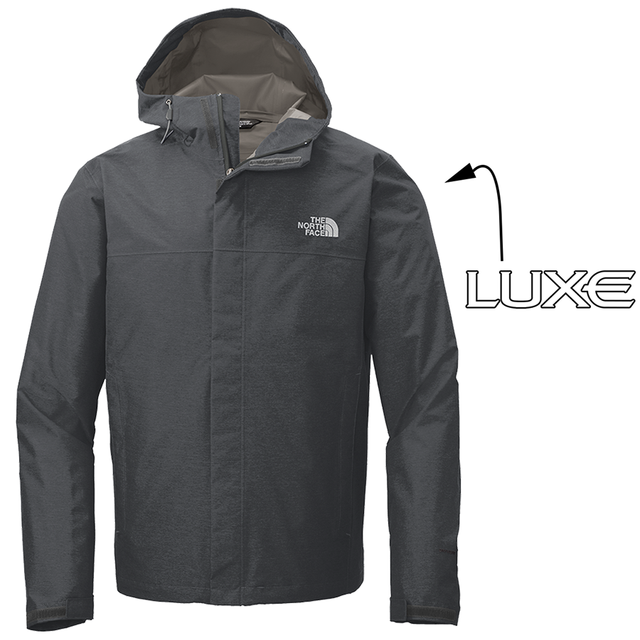 Dark Grey Heather Colored Men's North Face Rain Jacket with Arrow Pointing to where the Luxe Logo Will be Embroidered on Left Sleeve