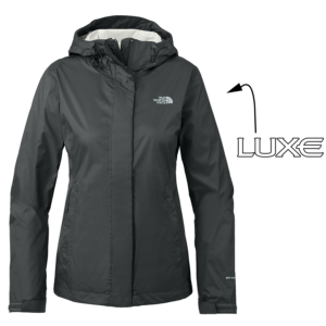Black Colored Women's North Face Rain Jacket with Arrow Pointing to where the Luxe Logo Will be Embroidered on Left Sleeve
