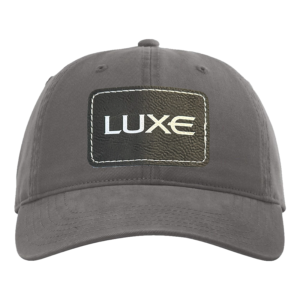 Charcoal Grey Twill Dad Hat with the Luxe Logo lasered on a patch on the front of the hat